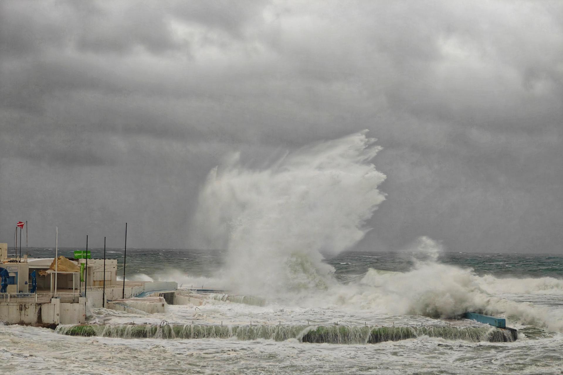 A huge wave crashing into the unrecognisable and flooded water polo pitch on the Sliema front on Monday evening. The mayor had to warn people to stay away from the seafront. Photo: Debbie Pisani