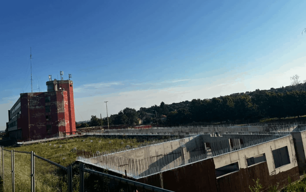 Firefighters sleep in hats and jackets, fighting rats and getting wet