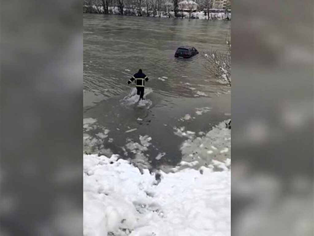 Heroic Firefighter Braves Icy River to Rescue Car in Bosnia Floods
