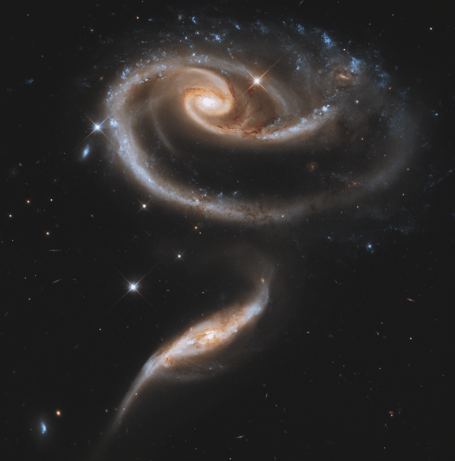 The "Rose of Galaxies" – Iconic Hubble Image of UGC 1810 and UGC 1813