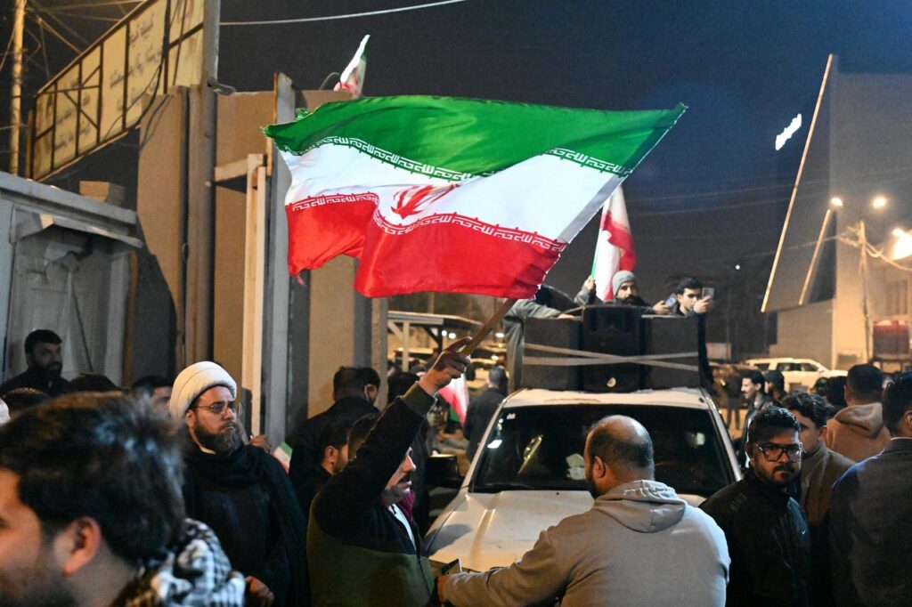 People gather in front of the Iranian Consulate General to protest against the anti-regime demonstrations that have been ongoing across Iran in recent days in Basra, Iraq, Jan. 13, 2026. (AA Photo)