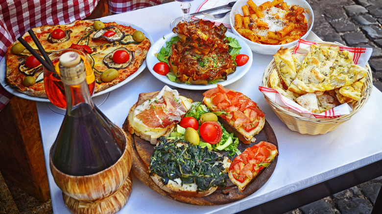 A variety of Italian dishes arranged on a table