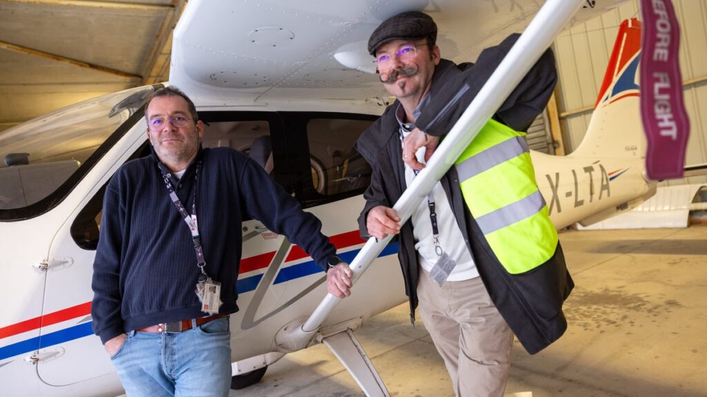 Luxembourg Flight Training Academy President Frank Mack (left) and LFTA Accountablity Manager Norman König lean against one of the group’s training planes.