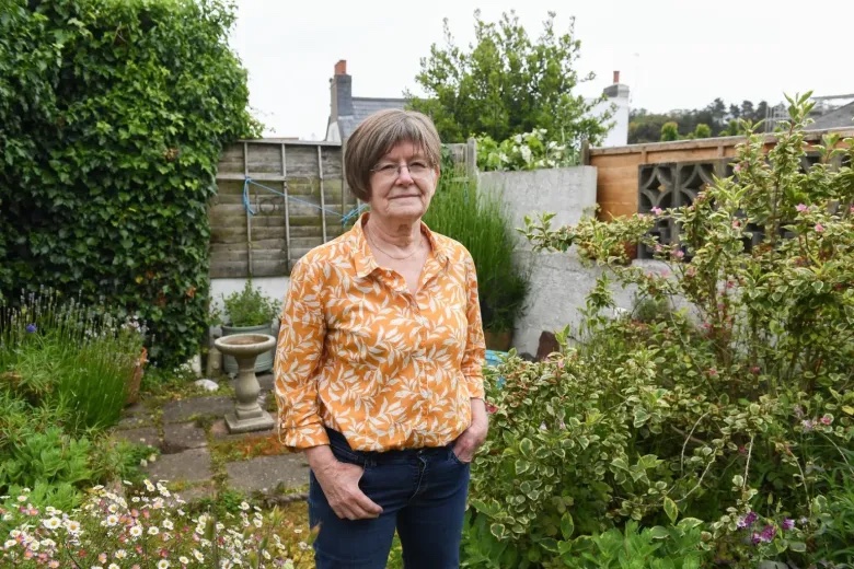 Tributes paid to teacher who took on the Environment Department