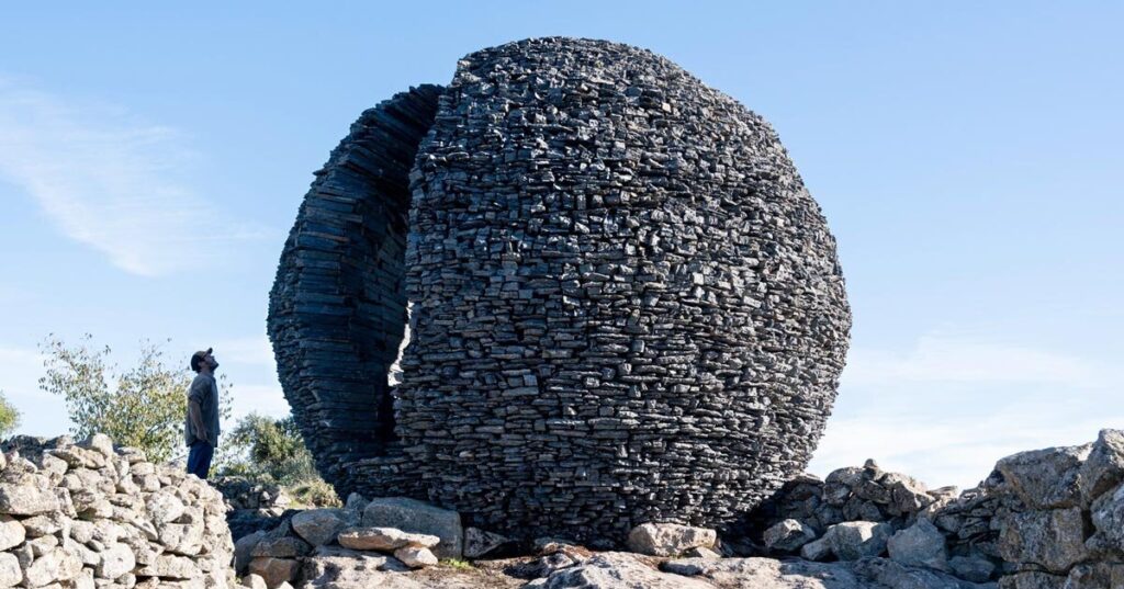 atelier yokyok sculpts sphere out of black schist in portugal atelier yokyok sculpts sphere out of black schist in portugal