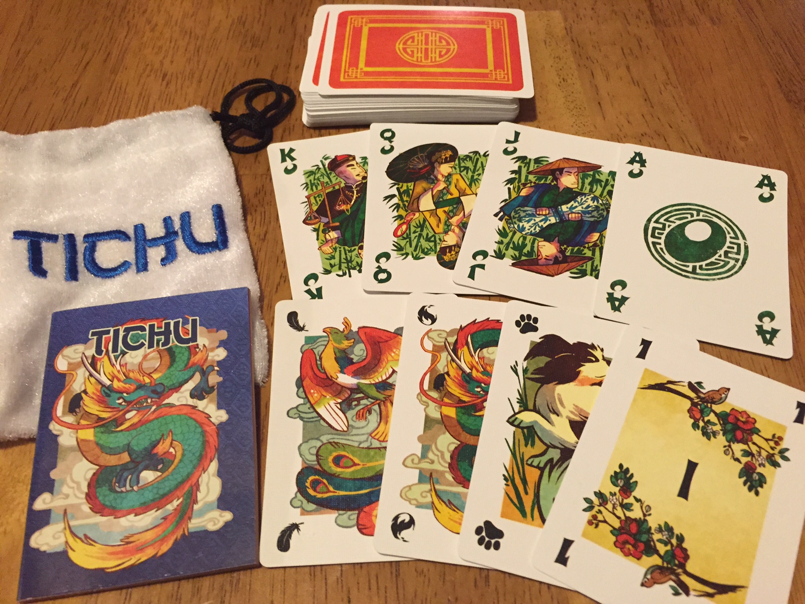 The whole pack of the card/board game Tichu. 