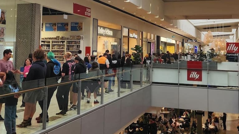Shoppers outside EB Games in Riccarton, Christchurch.