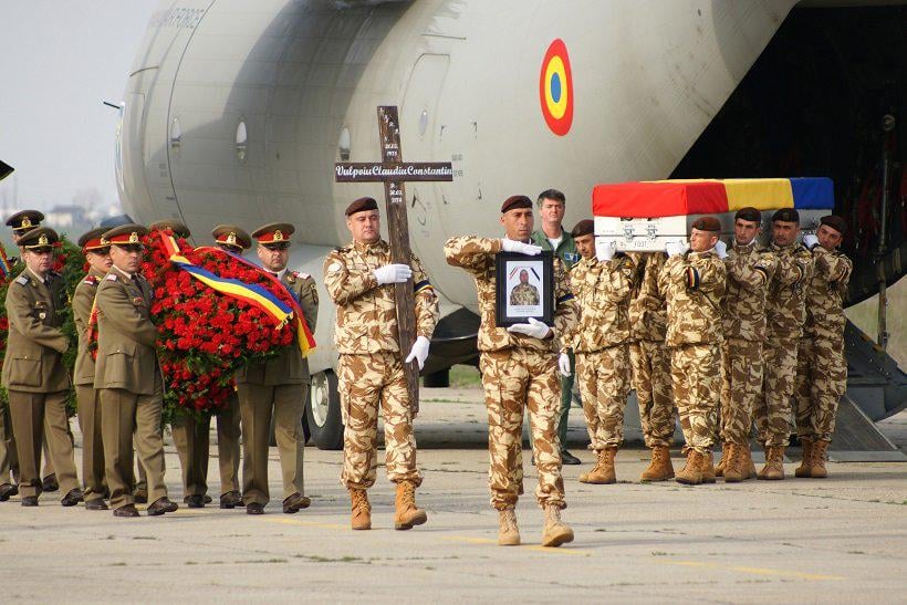 Romanian soldiers coming back home after doing nothing to help the USA