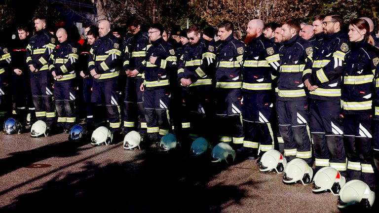 Firefighters also attended the service. Pic: Reuters