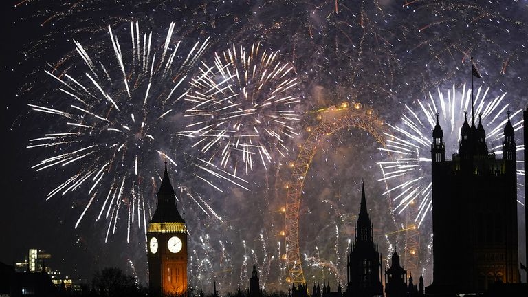 Fireworks illuminate Big Ben and the London Eye. Pic: AP