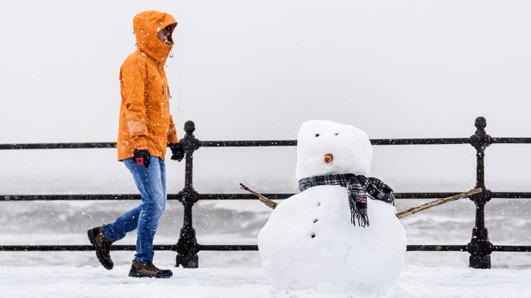 The sea front in Scarborough in Yorkshire was covered in snow on Saturday. Pic: PA.