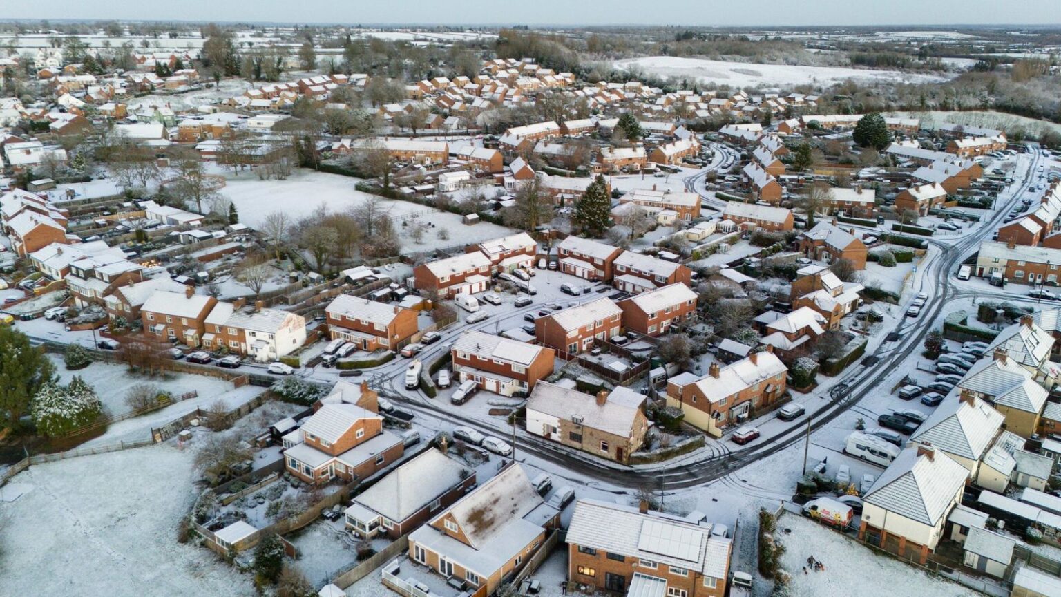 Snow-covered houses in Bishop's Itchington, Warwickshire, on Friday morning. Pic: PA