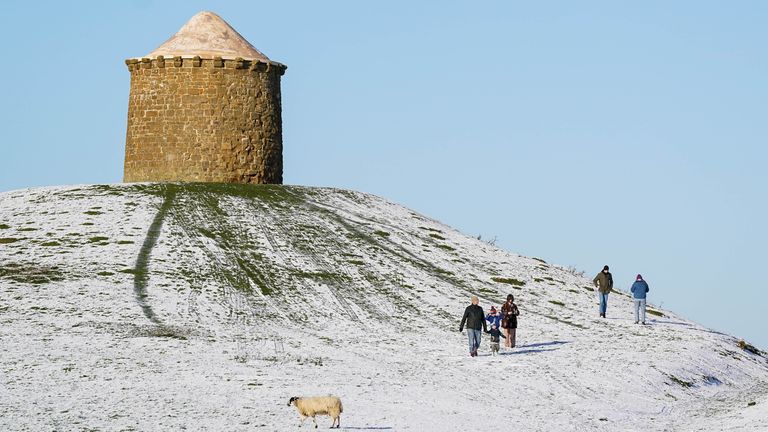 Walkers enjoying a trek through Burton Dassett Hills Country Park. Pic: PA