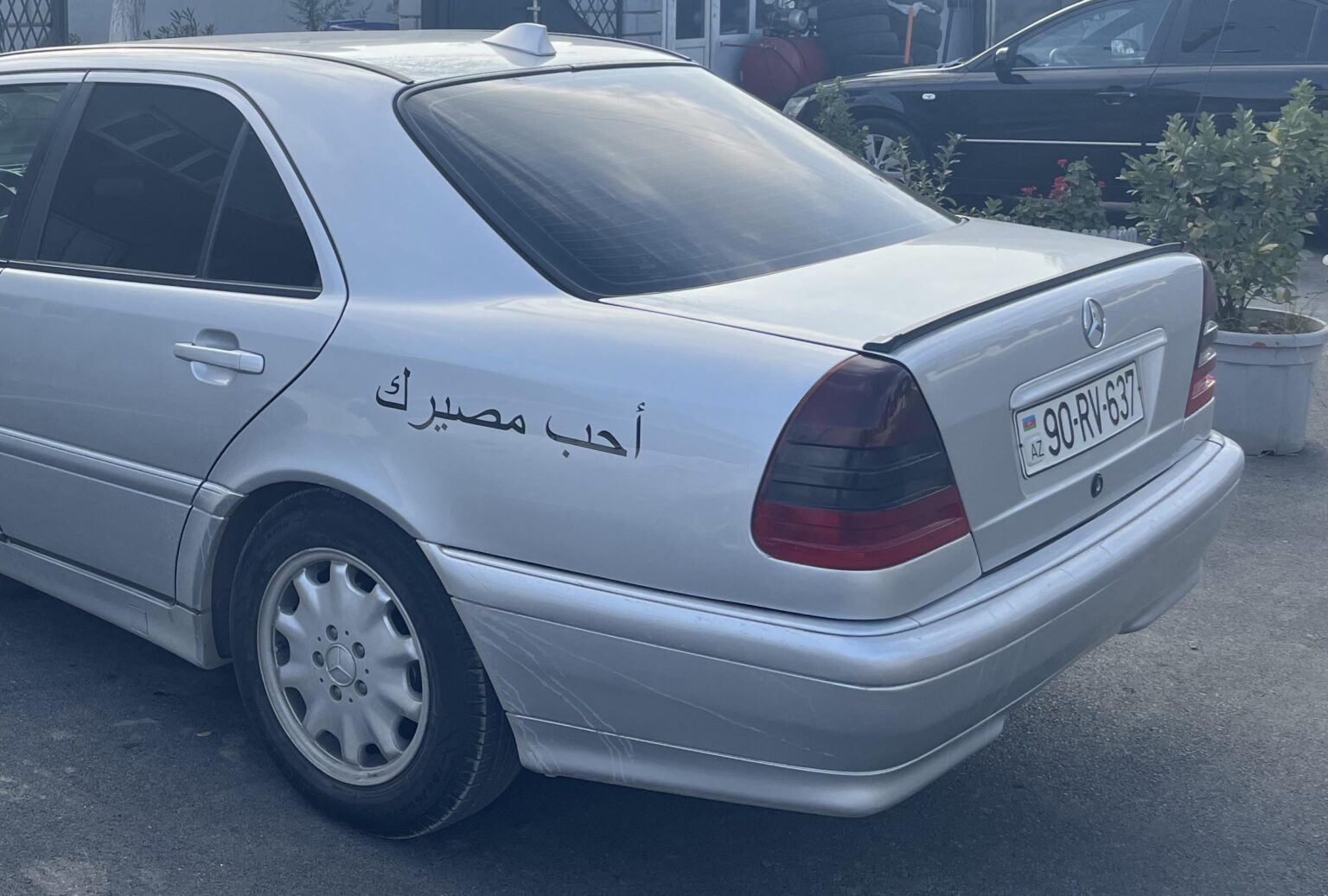 Why do people from Azerbaijan like to write on their cars in arabic language ?