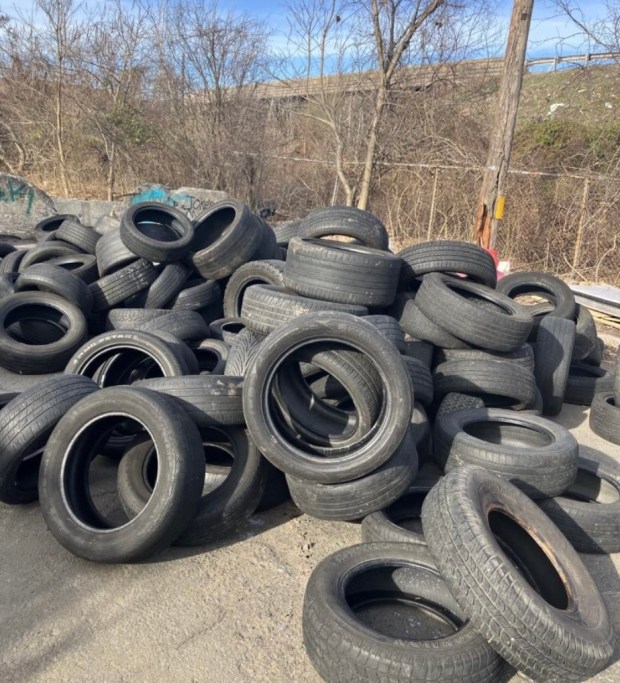 Piles of tires are illegal dumped in the Parkville area of Hartford. Last year, lawmakers passed an extended producer responsibility bill aimed at curbing illegal dumping, but a loophole in the law left out retailers. (Photo/Credit Hartford Police Department)