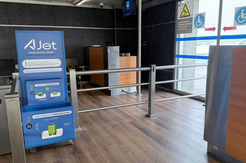 Turkish low-cost carrier AJet launches direct flights to Albania’s Tirana Photo shows AJet service display in modern terminal area in Sabiha Gokcen International Airport in Istanbul, Türkiye, accessed on Dec. 31, 2025. (Adobe Stock Photo)