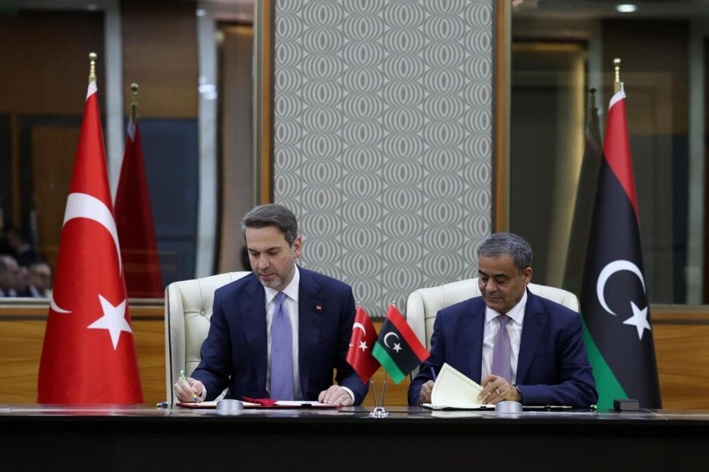 Türkiye’s minister of energy and natural resources, Alparslan Bayraktar, with Libya’s minister of transport Mohammed Shahoubi signing of a memorandum of understanding, Jan 24 , 2026 ( Photo via X / @aBayraktar1)