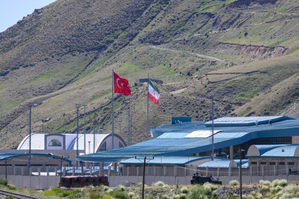 Iranian and Turkish flags fly in Türkiye at the Razi-Kapikoy border crossing, north-eastern Türkiye, on June 19, 2025. (AFP Photo)