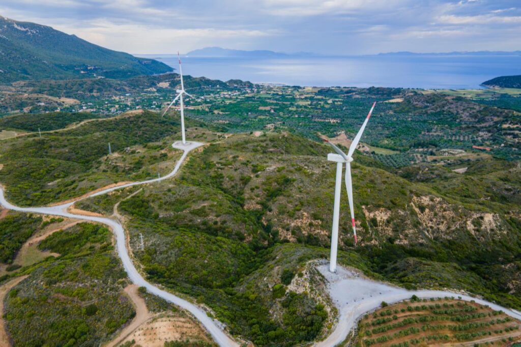 Türkiye’s wind power output hits all-time daily high Wind turbines are seen atop green hills overlooking the Aegean Sea in western Türkiye. (Adobe Stock Photo)