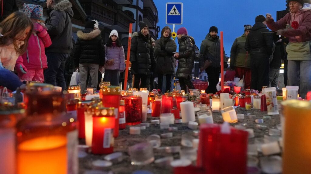 Swiss investigators believe sparkling candles ignited fatal bar fire