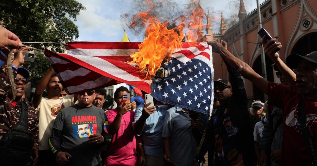 At home and abroad, Trump challenges anyone to stop him