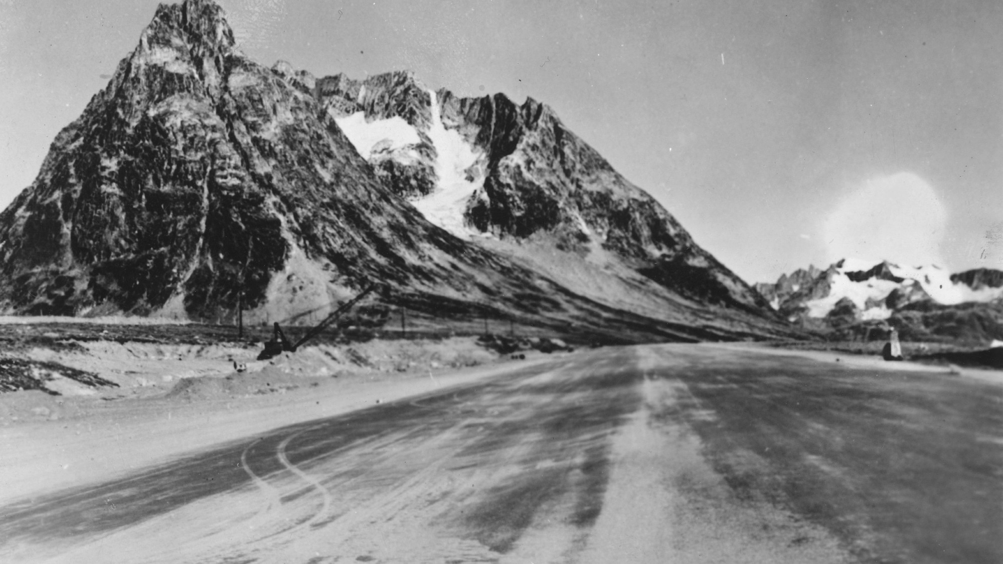 an empty American airstrip on Greenland with a mountainous backdrop