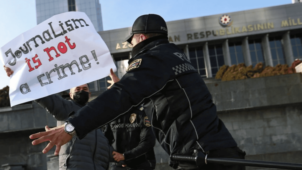 Ulvi Hasanli unfurls a banner during a protest outside the Milli Majlis | Photo: Reuters
How Azerbaijan spent 2025