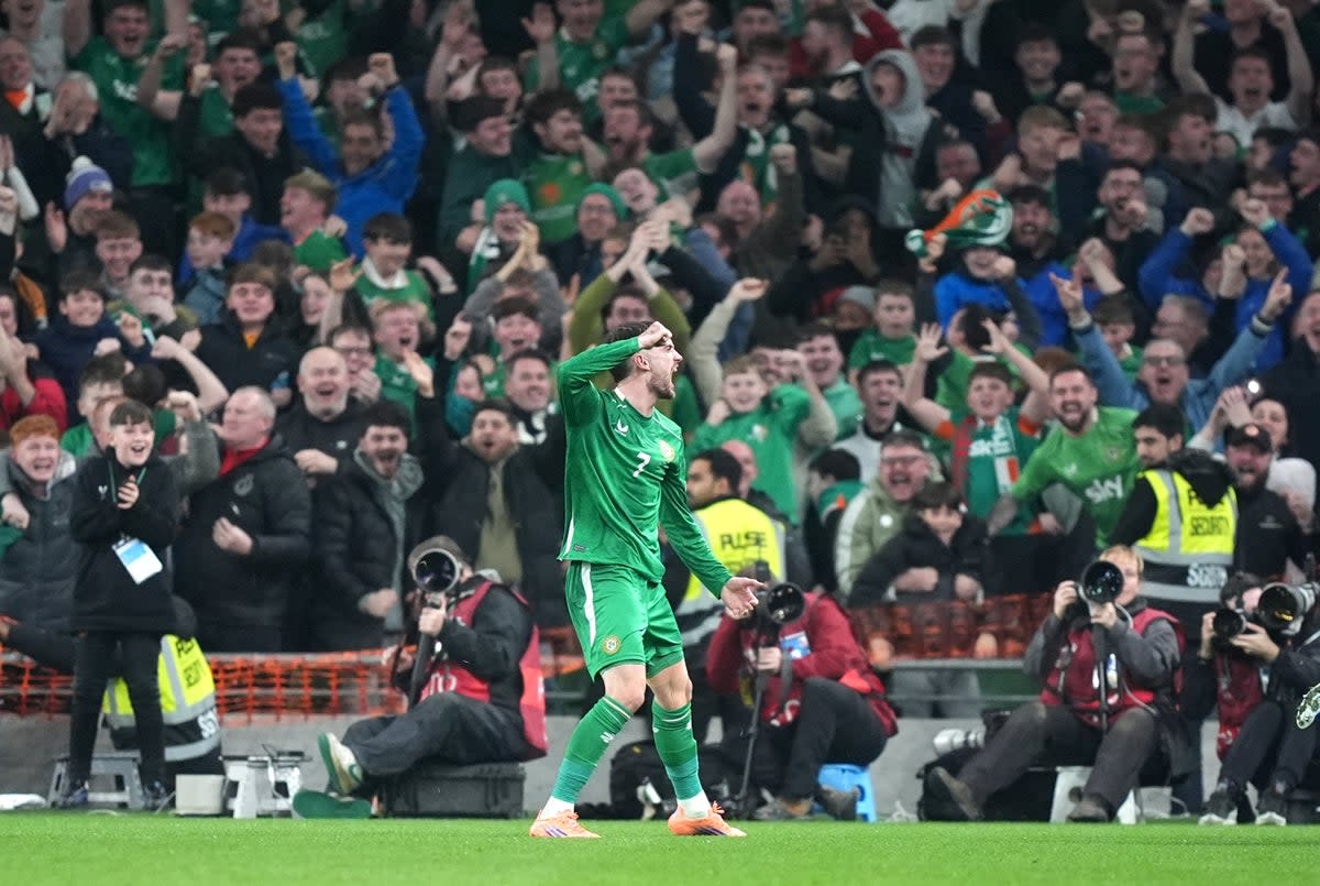 Parrott celebrates in front of the Ireland fans after scoring against Portugal (PA Wire)