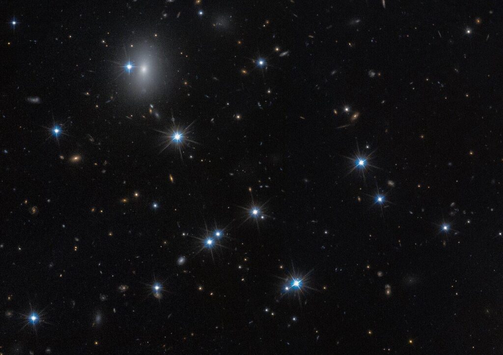 Hubble identifies a near-invisible galaxy that may be 99% dark matter
