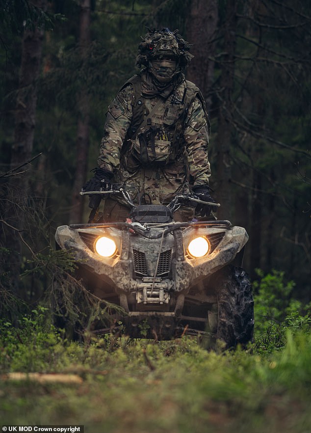 A British soldier (pictured) from 1 Mercian is seen here riding a quad bike during exercise Hedgehog in Estonia.