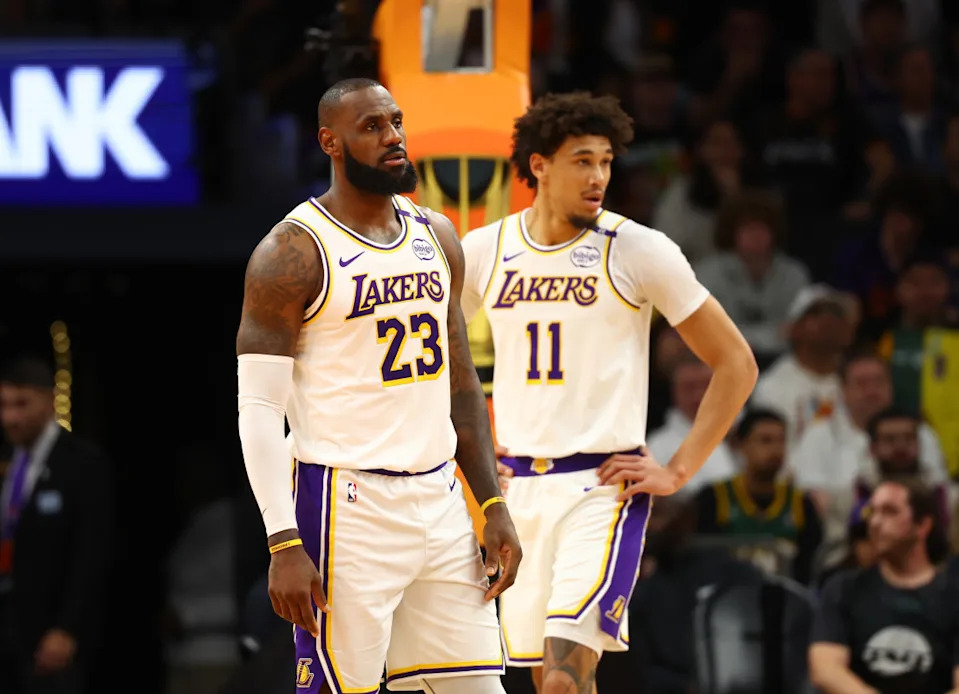 Los Angeles Lakers forward LeBron James (23) and center Jaxson Hayes (11).© Mark J&period; Rebilas-Imagn Images