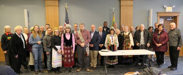 Knights of Lithuania raise flag at Pittston Memorial Library Times Leader