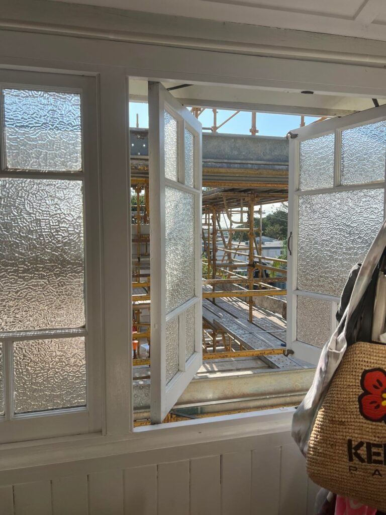 REPOST: CEO of Urban List is building a new house next door, and is currently only at two stories out of six total (see photos).