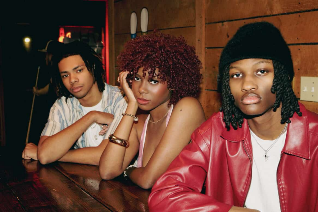 De'Marcus Robateau (from left), a freshman mechanical engineering major, KJ Parker, founder of Talent Co and a sophomore health science major, and D'Mari O'Neal, a first-year finance major, pose for a photo. The Talent Co is a student organization focused on making the entertainment industry more accessible to college students. (Courtesy of Talent Co)