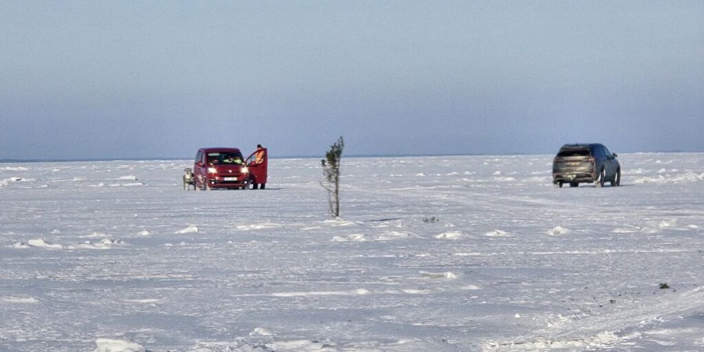Driving across the frozen sea on Estonia’s icy road Driving across the frozen sea on Estonia's icy road