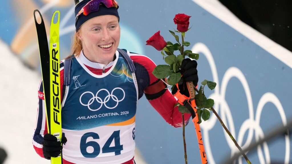 Maren Kirkeeide of Norway takes gold in the biathlon sprint during her Olympic debut