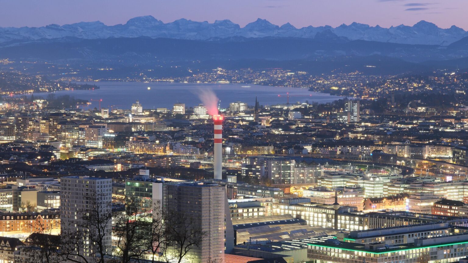 Dusk in the city of Zurich photographed from the Hönggerberg. (Waid viewpoint)