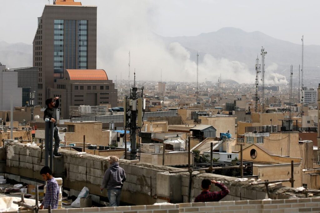 Smoke rises over the city after an Israeli army launches 2nd wave of airstrikes on Iran on February 28, 2026. (AA Photo)