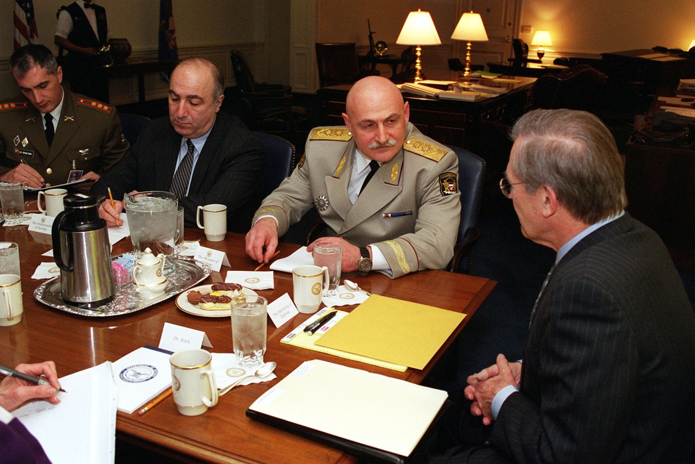 Secretary Rumsfeld meets in his Pentagon office with Minister of Defense David Tevzadze of the Republic of Georgia.