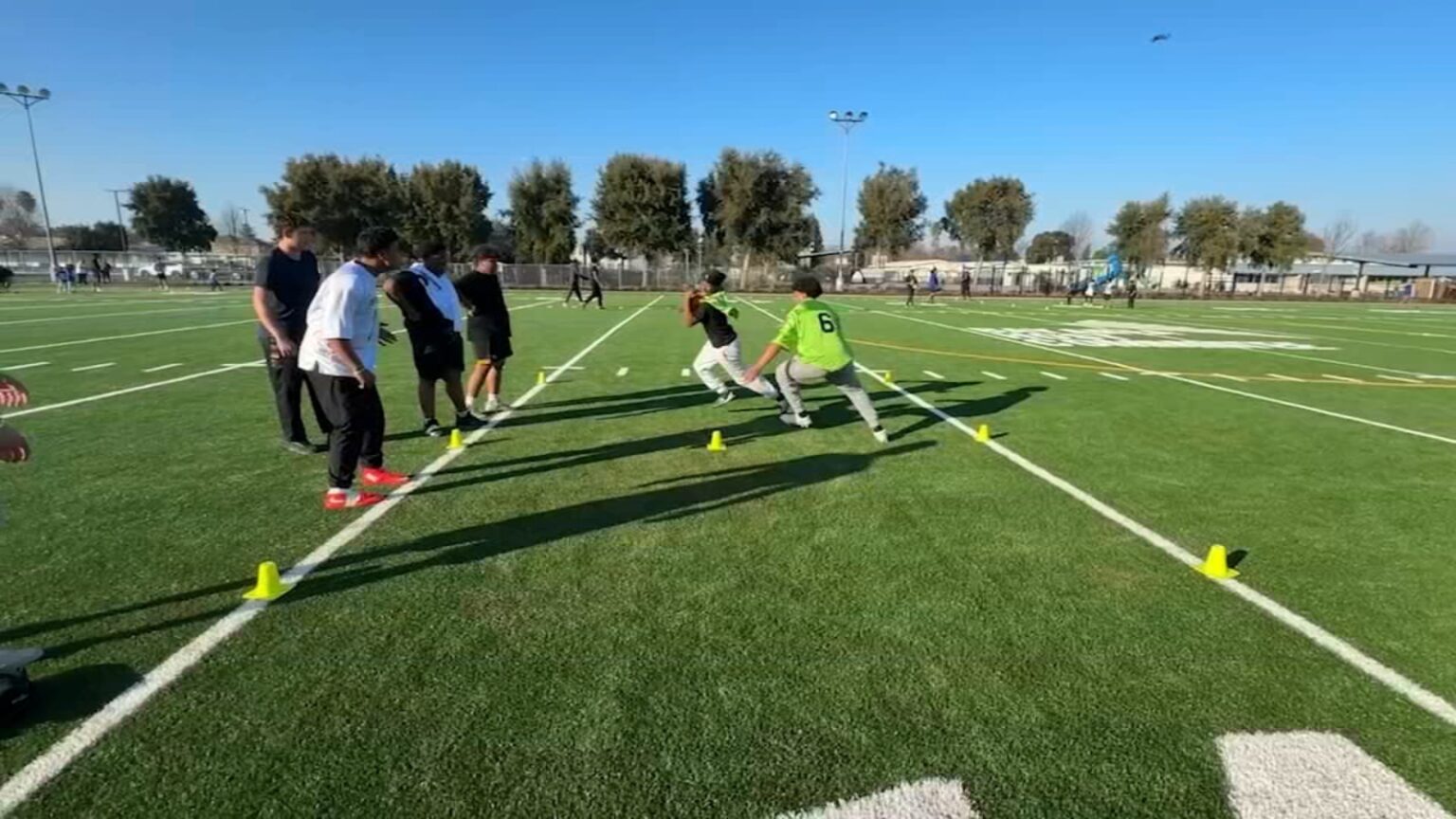 NFL athletes help students celebrate new sports field in East Palo Alto
