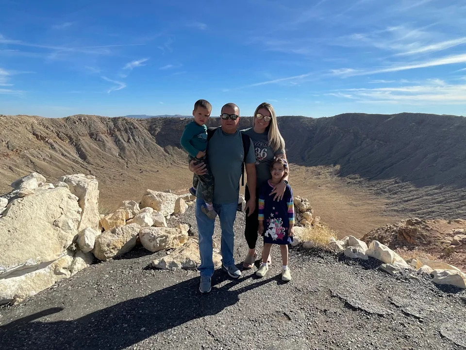 Izabela Oquendo and her husband and children in Arizona.