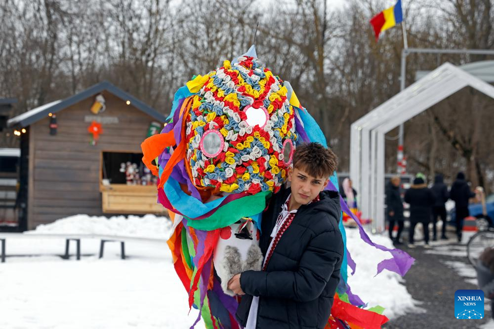 Masked people take part in "Cuckoo's Day" festival in Branesti, Romania -Xinhua