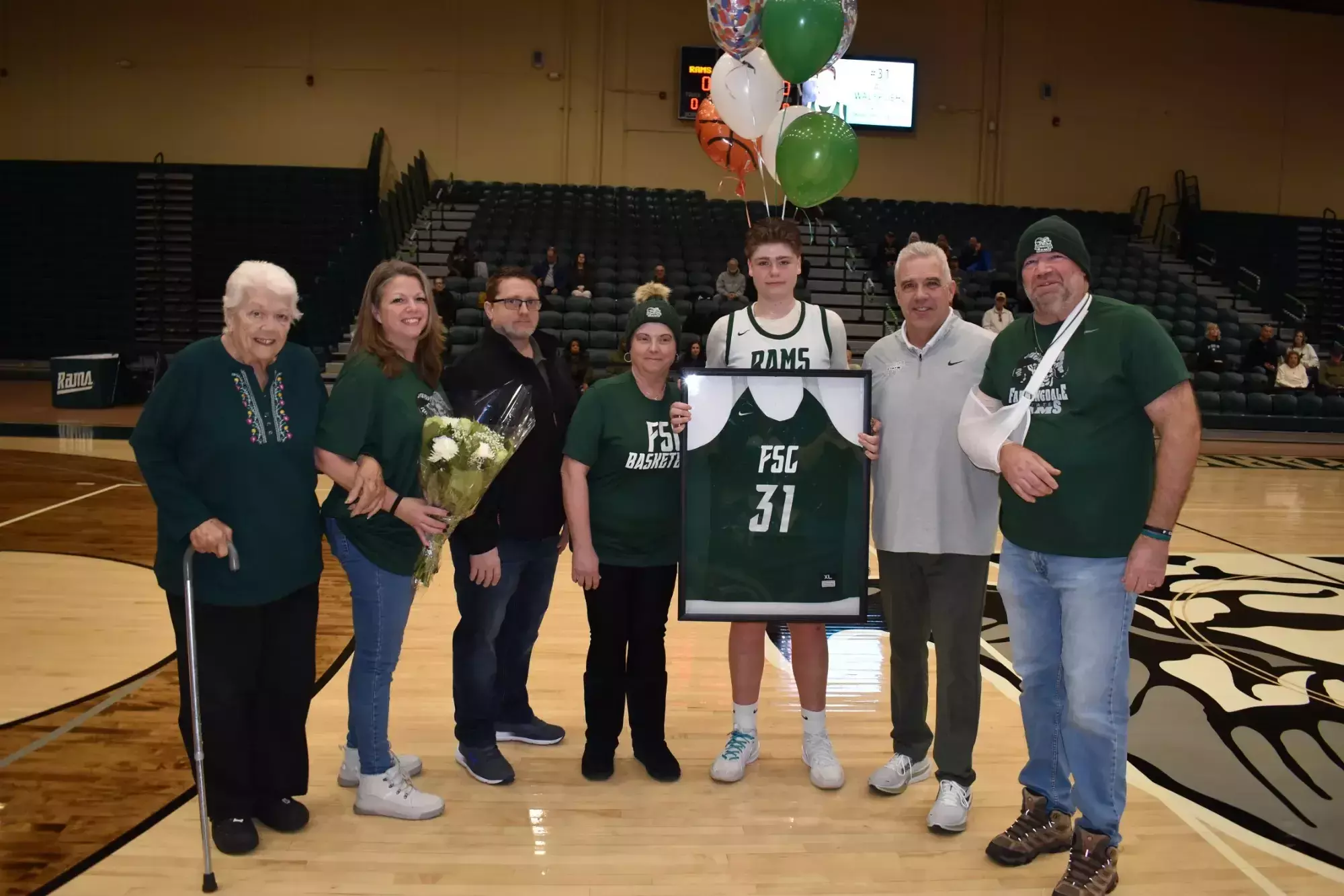 2026 Women's Basketball Senior Day - Alexandria Walbroehl with family and coach