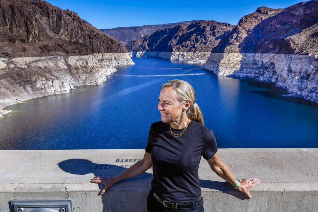 Global water advocate Mina Guli stands atop Hoover Dam following a press conference on Tuesday, ...