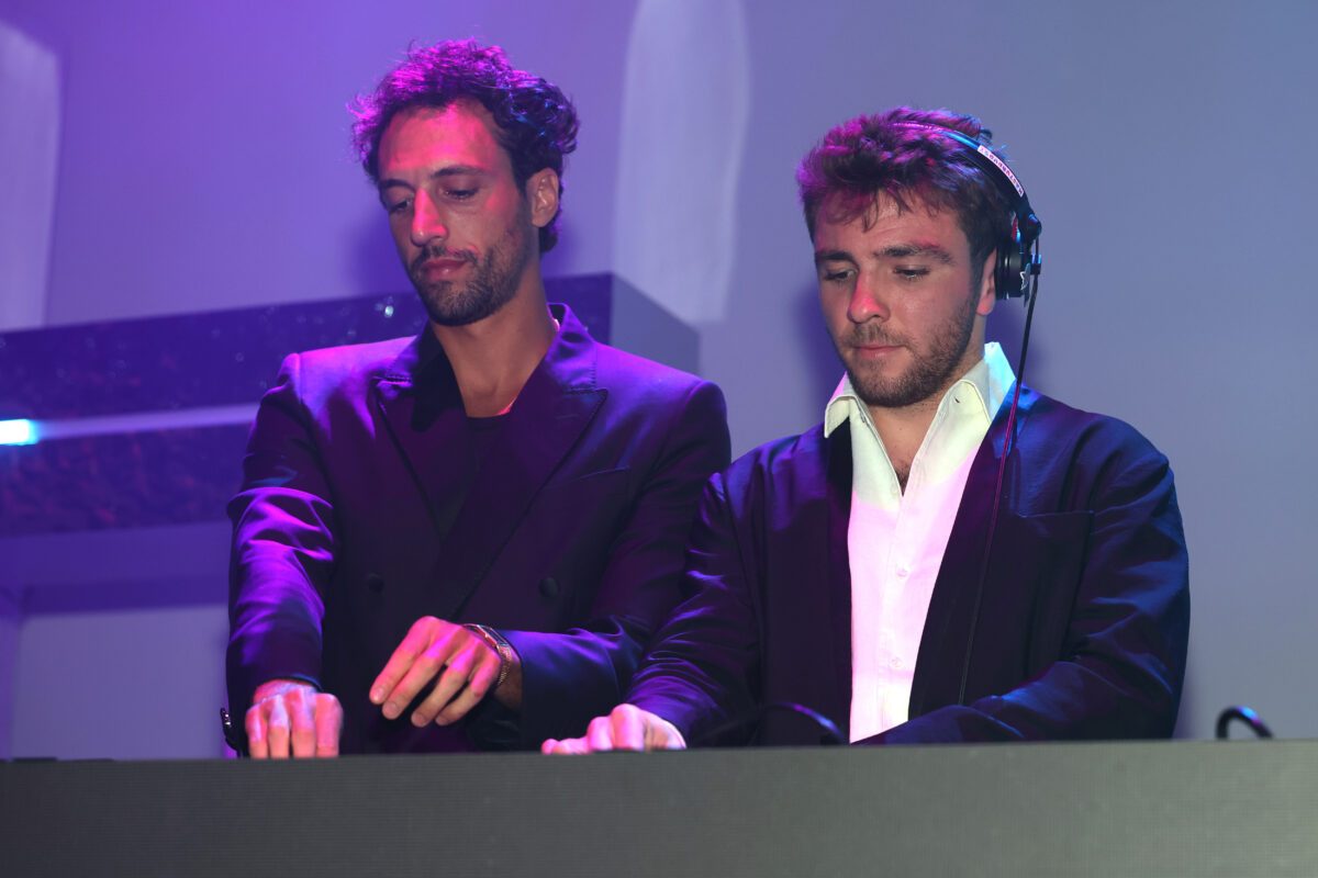 Rocco Ritchie (R) performs onstage during the Warner Music Group Pre-Grammy awards party on January 29, 2026 