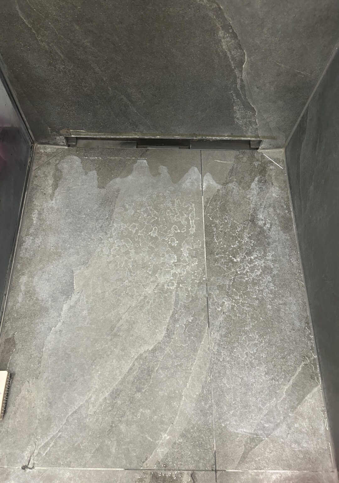 My bathroom surfaced ruined from acidic cleaner and i m worried about deposit.
