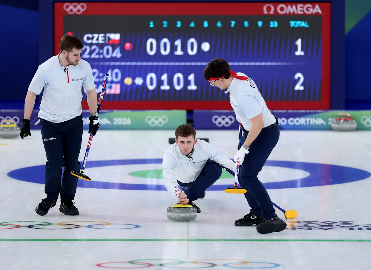 CORTINA D'AMPEZZO, ITALY - FEBRUARY 11: Daniel Casper of Team United States competes with Ben Richardson and Aidan Oldenburg of Team United States during the Men's Round Robin Session One match between Team Czechia and Team United States on day five of the Milano Cortina 2026 Winter Olympic games at Cortina Curling Olympic Stadium on February 11, 2026 in Cortina d'Ampezzo, Italy. (Photo by Julian Finney/Getty Images)