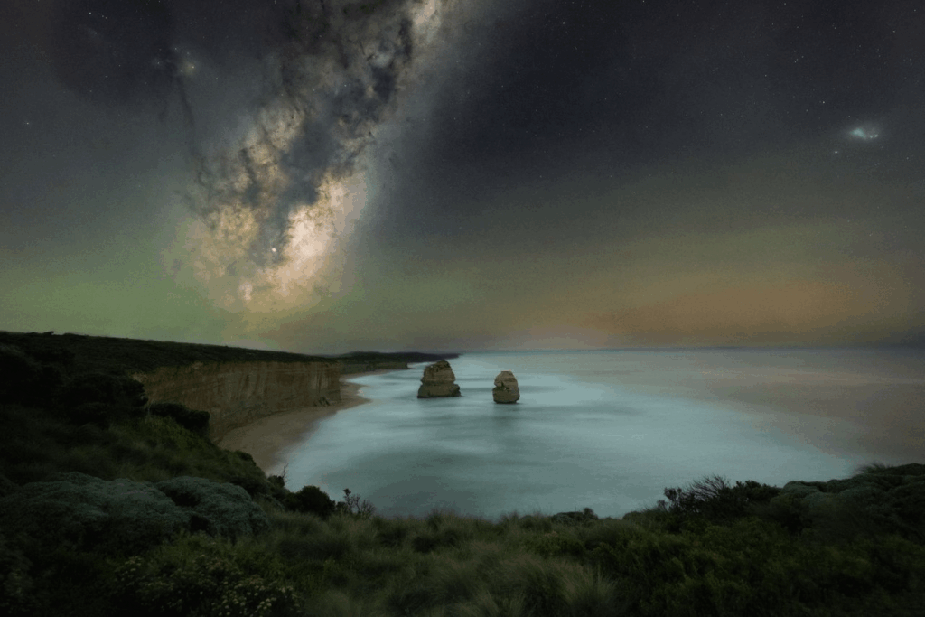 The Milky Way and the aurora borealis over the coast, Australia