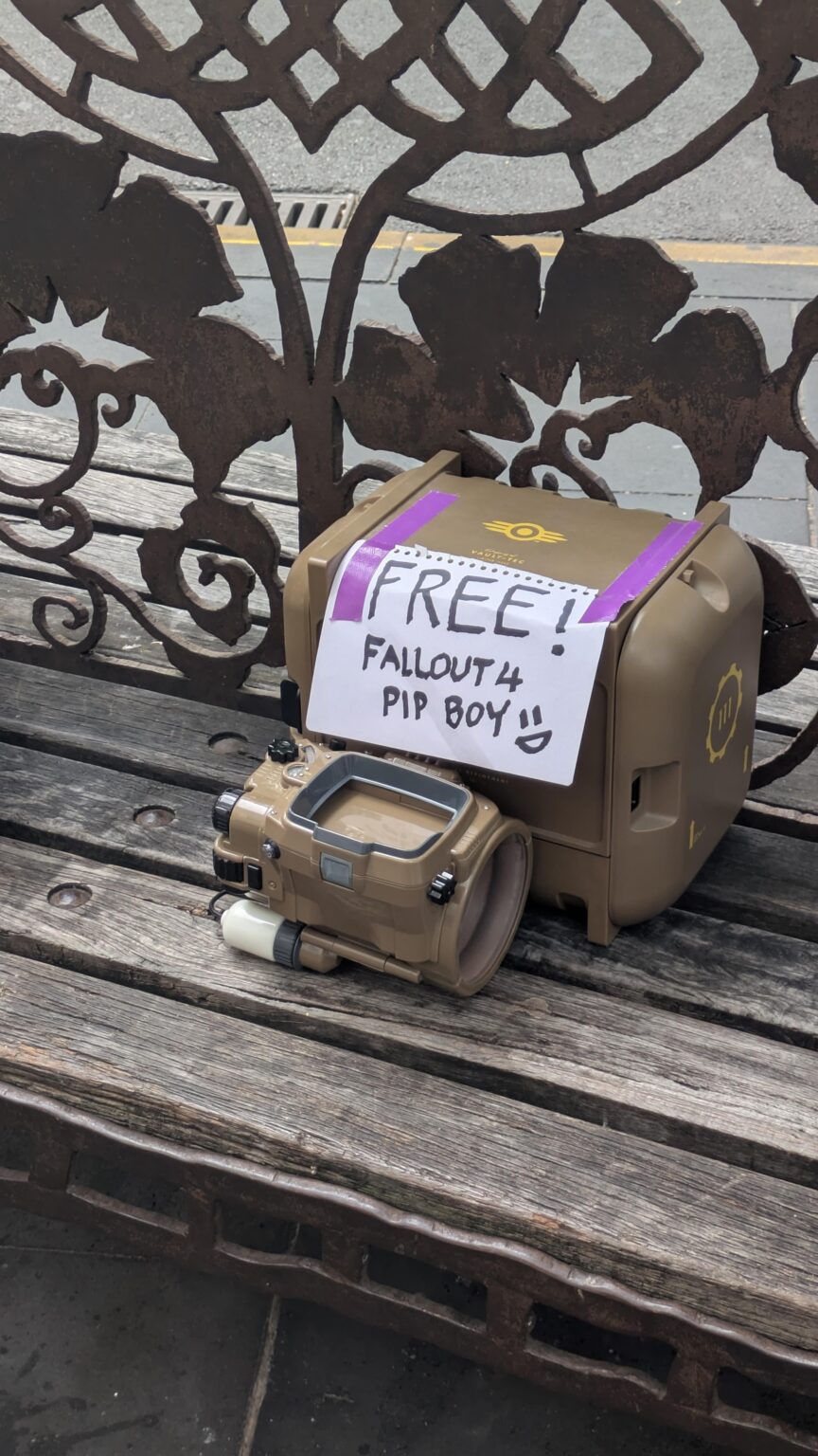 Fallout 4 pip boy in the middle of the city.