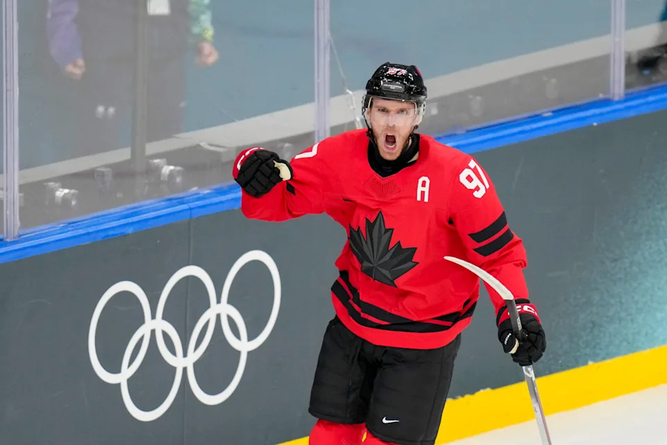 Milan, Italy - February 13: Connor McDavid of Canada celebrates after scoring his team's first goal during the Ice Hockey - Preliminary Round - Group A match between Canada and Switzerland at Milano Santagiulia Ice Hockey Arena on February 13, 2026 in Milan, Italy. (Photo by Alex Gottschalk/DeFodi Images/DeFodi via Getty Images)